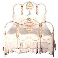 vintage style features your girl's name hand-painted and encircled by lavender ribbons and pink flowers on the headboard and footboard. Beautifully crafted of high quality iron, it has that "French antique market" flair.