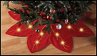 Poinsettia tree skirt has golden embroidery trim and golden LED lights for a sparkling touch.