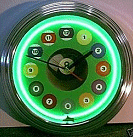 Fans of pool won't find a cooler clock than this Billiards Chrome Finished Neon timekeeper. Featuring a green billiards face (1-12 small billiard balls with a big 8 ball in the middle), chrome finished blue neon, quartz movement clock, and all-American style. Great for gameroom or garage. Great 3 tiered art deco rim. Great clock! Neon lasts upwards of 10 years. mixed media neon plastic and glass  -  man cave home bar decorations. 