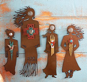 Artfully cut from rusted steel with floated, dimensional layers painted in red, turquoise, silver and gold, the handcrafted Spirit Woman Wall Art brings feminine spirit to your wall.